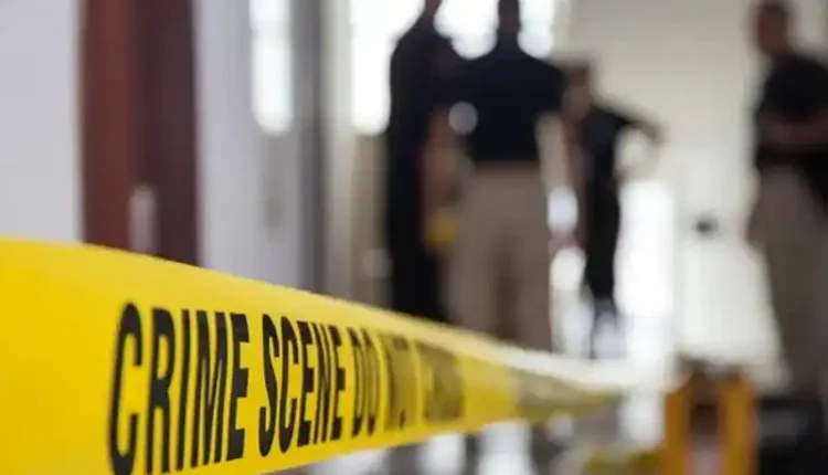Karachi police at crime scene after Independence Day aerial firing leaves three dead and over 100 injured.