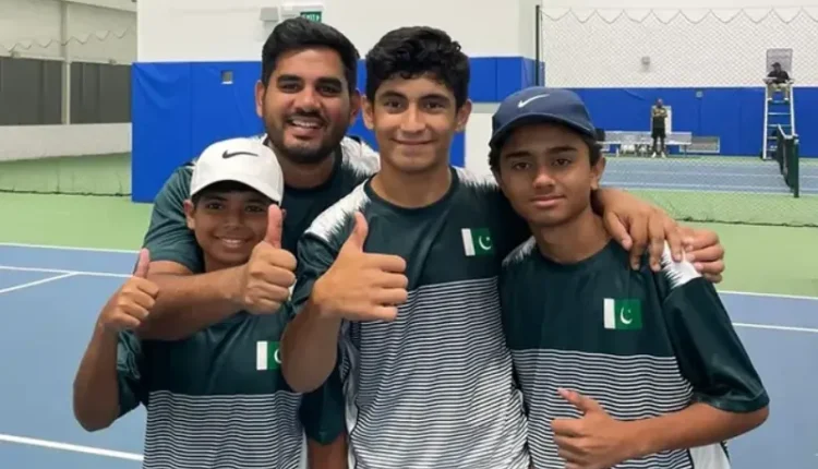 Pakistan's junior tennis stars celebrate together after a big win on the court.