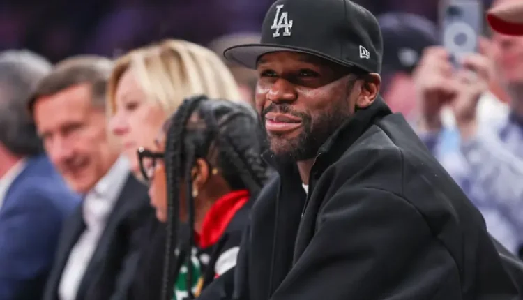 Floyd Mayweather and Mike Tyson face off for 2026 exhibition boxing match announcement.