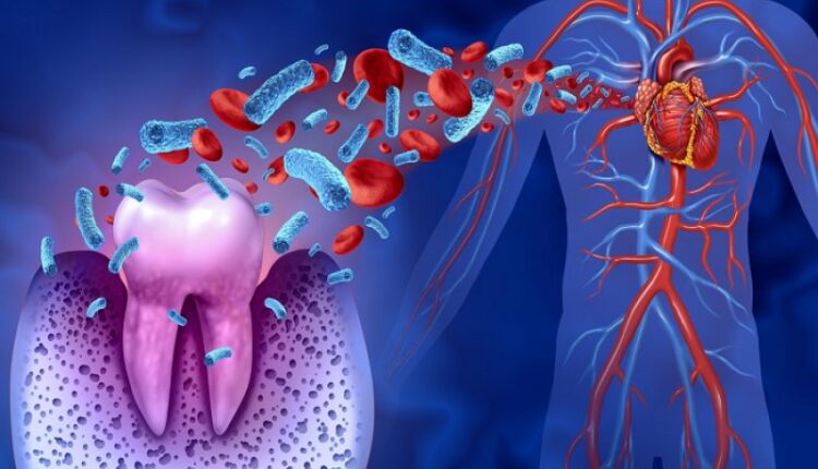 A person happily brushing their teeth, showing the link between daily oral care and a healthy heart.