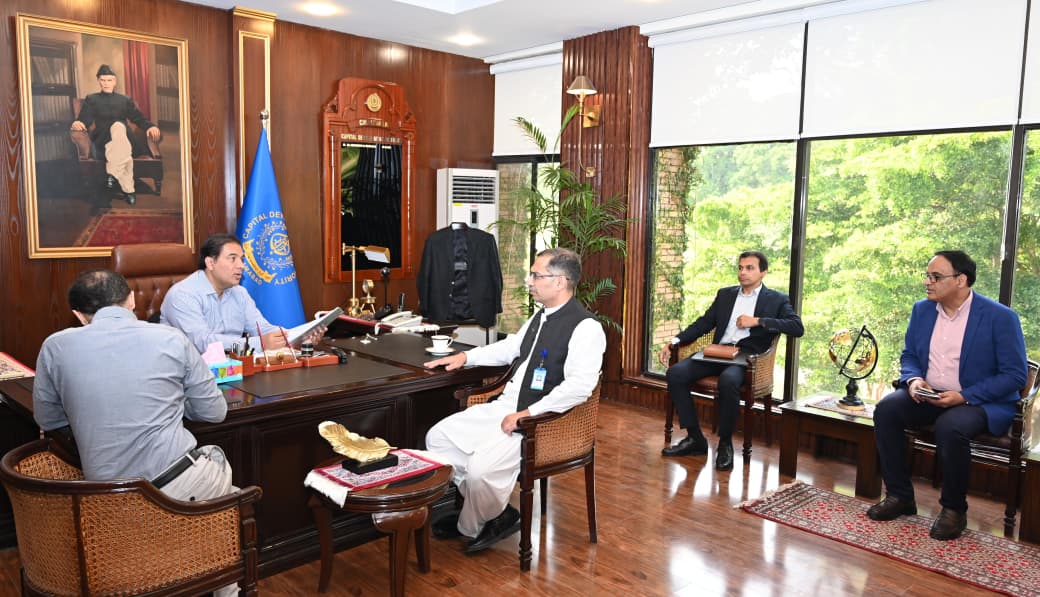 CDA Chairman Muhammad Ali Randhawa with GM SNGPL Adnan Ahmed discussing Islamabad gas pipeline project at CDA Headquarters.