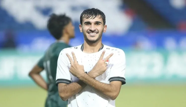 "Iraq celebrates after defeating Pakistan 8-1 in AFC U23 Asian Cup Qualifier at Phnom Penh Stadium.