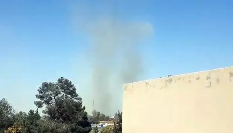 Smoke clouds rise after Quetta blast near FC headquarters, with police and rescue teams responding to casualties on site.