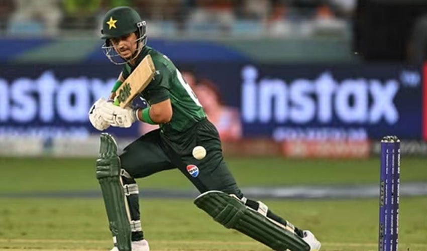 Pakistan cricketer Saim Ayub walking back to the pavilion after being dismissed for a duck.